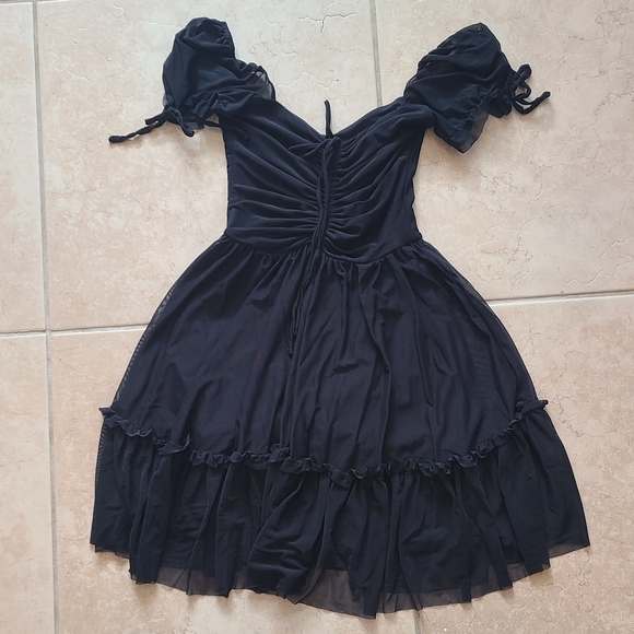 Elegant Black Dress with Sheer Sleeves - Picture 6 of 14